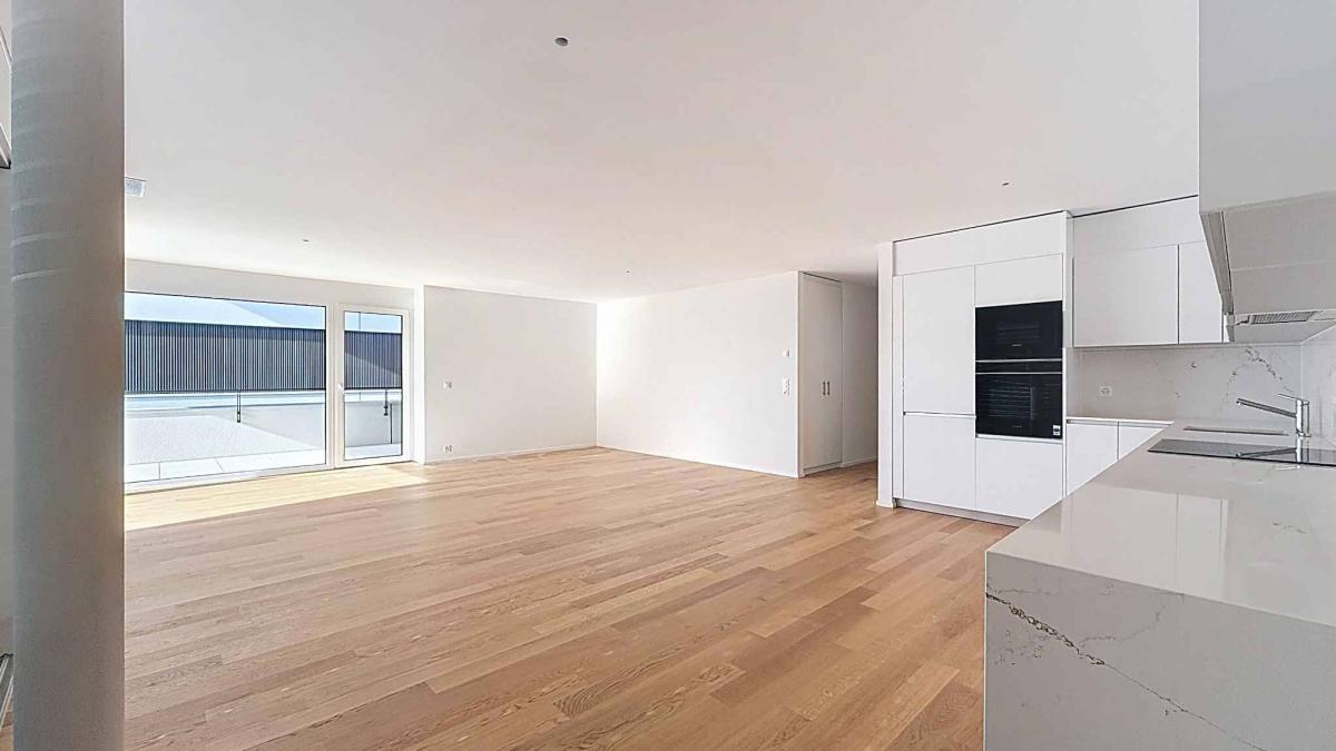 Luxueux 4.5 pièces traversant avec balcon couvert de 76m2 et vue lac