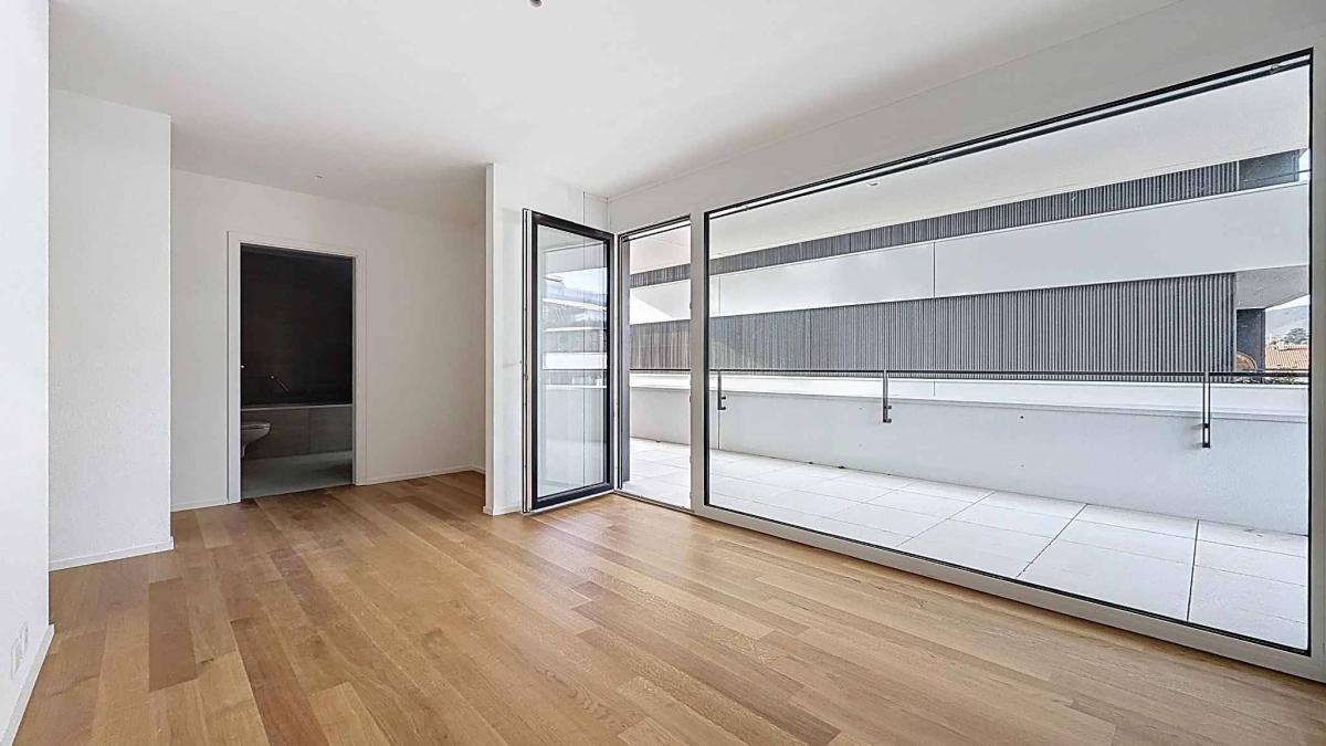 Luxueux 4.5 pièces traversant avec balcon couvert de 76m2 et vue lac