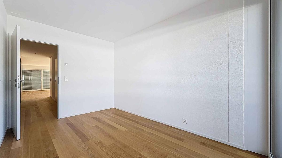 Luxueux 4.5 pièces traversant avec balcon couvert de 76m2 et vue lac