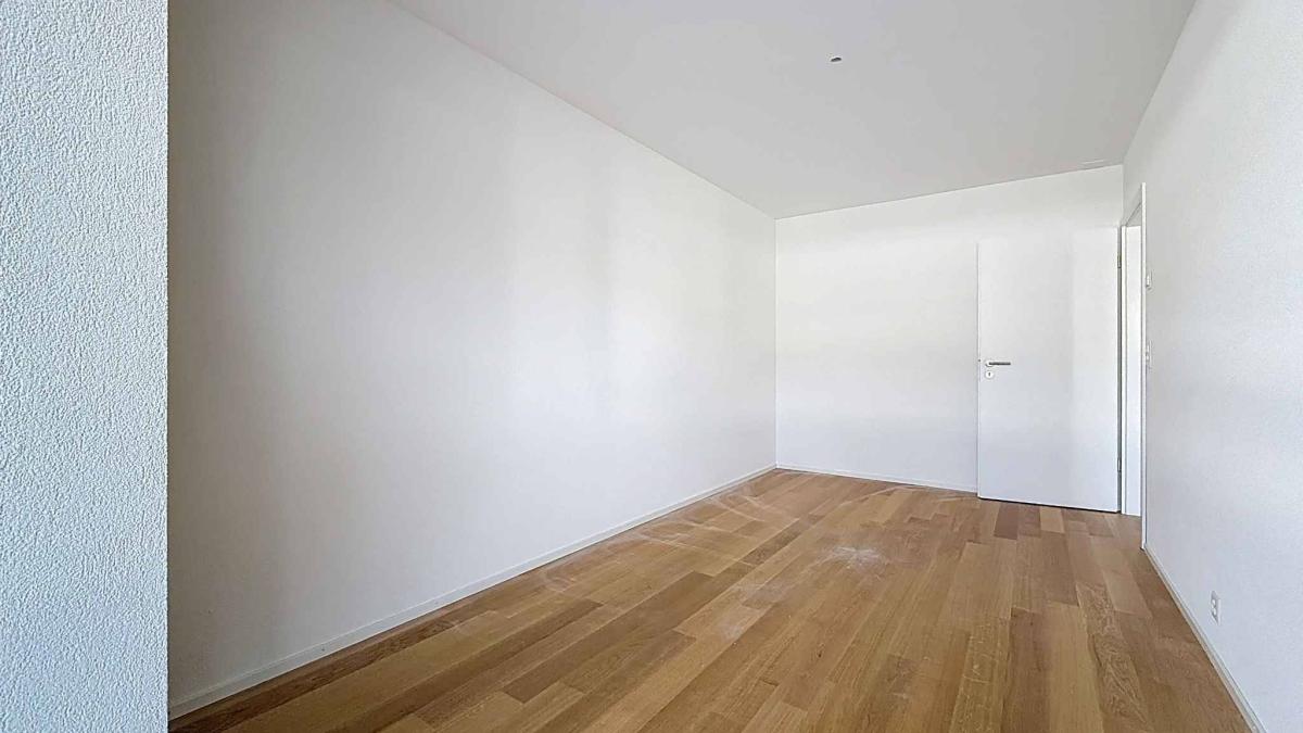 Luxueux 4.5 pièces traversant avec balcon couvert de 76m2 et vue lac