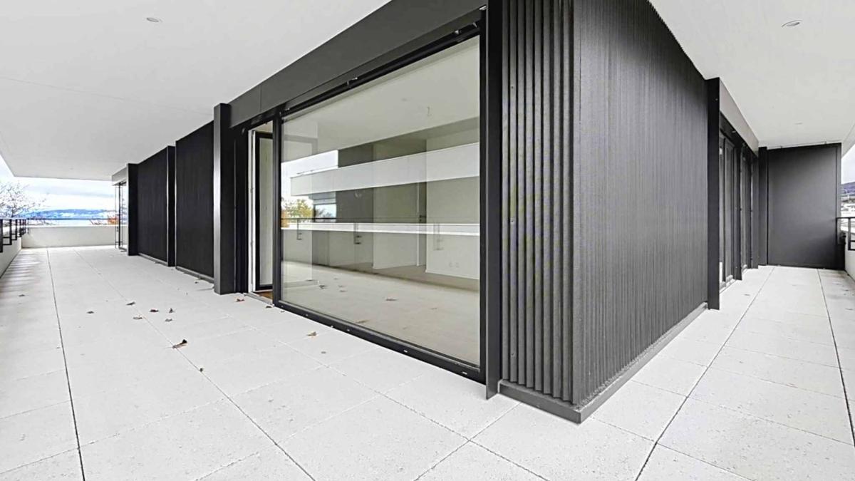 Luxueux 4.5 pièces traversant avec balcon couvert de 76m2 et vue lac
