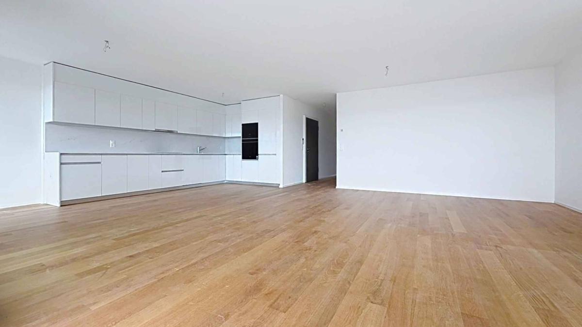 Luxueux 4.5 pièces traversant avec balcon couvert de 76m2 et vue lac