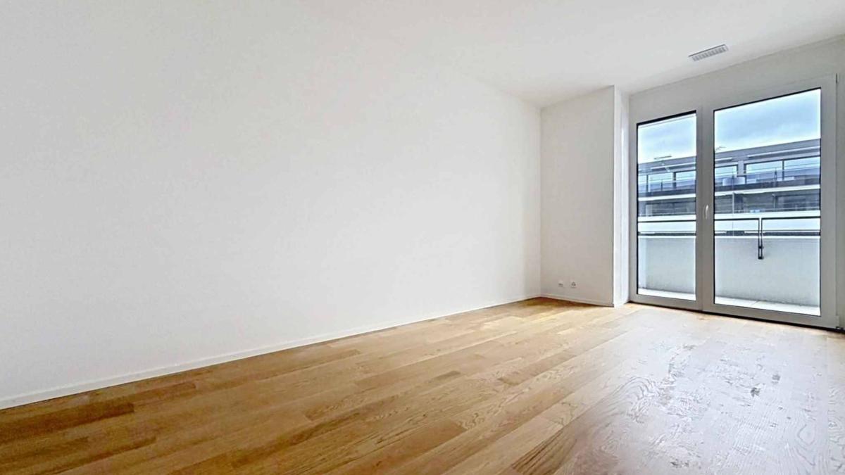 Luxueux 4.5 pièces traversant avec balcon couvert de 76m2 et vue lac