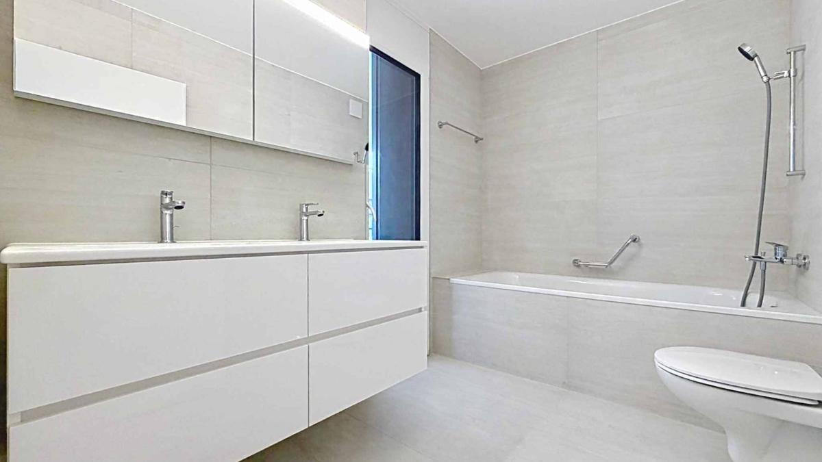 Luxueux 4.5 pièces traversant avec balcon couvert de 76m2 et vue lac