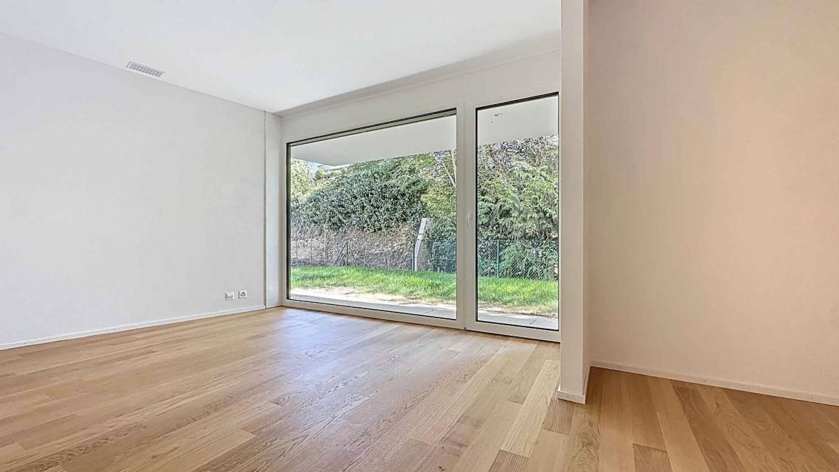 Exceptionnel 5.5 pièces au rez-de-chaussée avec terrasse et jardin privatif vue lac