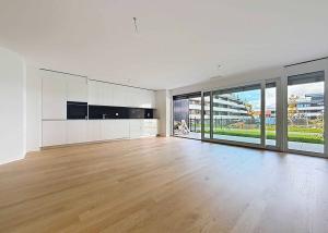 Appartement neuf de 3.5 pièces avec 2 terrasses et 2 jardins Ouest/Est