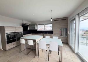 Appartement avec vue sur le lac et les montagnes